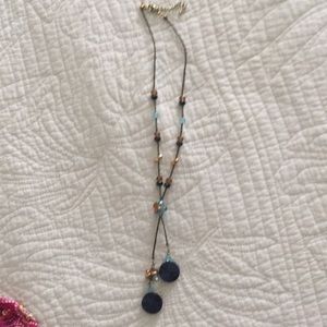 Necklace blue and gold stones